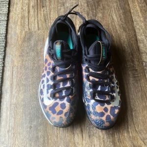 Woman’s cheetah print Nike zoom